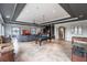 Spacious basement with a pool table, bar, TV, and lounge area for relaxing and entertaining at 7440 Riverside Dr, Punta Gorda, FL 33982