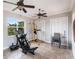Bright exercise room with window and mirrored wall at 7440 Riverside Dr, Punta Gorda, FL 33982