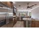 Gourmet kitchen with stainless steel appliances, granite countertops, and custom wood cabinetry at 7440 Riverside Dr, Punta Gorda, FL 33982