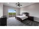Spacious main bedroom with private balcony and view at 7440 Riverside Dr, Punta Gorda, FL 33982