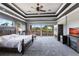 This is a spacious main bedroom with a seating area and a private balcony with a beautiful view at 7440 Riverside Dr, Punta Gorda, FL 33982