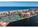 An aerial view of the waterfront community with tennis courts and waterfront access at 85 Vivante Blvd # 8542, Punta Gorda, FL 33950