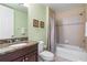 Bathroom with a tiled shower, bathtub, and a vanity with a granite countertop at 85 Vivante Blvd # 8542, Punta Gorda, FL 33950