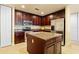 Well-appointed kitchen with stainless steel appliances, granite countertops, and ample cabinet space at 85 Vivante Blvd # 8542, Punta Gorda, FL 33950