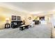 Open-concept living room flows into dining and kitchen areas, furnished with comfortable seating and stylish decor at 85 Vivante Blvd # 8542, Punta Gorda, FL 33950