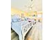 Bright bedroom featuring two beds, wooden floors and decor throughout at 9400 Little Gasparilla Is # C2, Placida, FL 33946