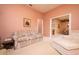 Inviting bedroom offers a relaxing atmosphere with comfortable seating and neutral tones at 10488 Princess Ct, Punta Gorda, FL 33955