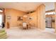 Dining area adjacent to the kitchen, featuring neutral colors and bright lighting at 10488 Princess Ct, Punta Gorda, FL 33955