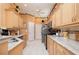 Well-equipped kitchen with modern stainless appliances, granite counters, and ample cabinet storage at 10488 Princess Ct, Punta Gorda, FL 33955