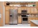 Updated kitchen boasts stainless appliances, generous counter space, and abundant cabinet storage at 10488 Princess Ct, Punta Gorda, FL 33955