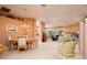 Spacious and open living area with neutral decor and a view to an adjacent room at 10488 Princess Ct, Punta Gorda, FL 33955