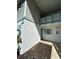 Condo exterior entrance with painted door and matching shutters provides a welcome at 1051 Forrest Nelson Blvd # M 103, Port Charlotte, FL 33952