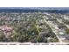 Beautiful aerial view of a property nestled among lush trees and greenery in a tranquil neighborhood at 1055 & 1075 Yorkshire St St, Port Charlotte, FL 33952