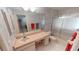 Bathroom boasts a vanity with lots of counter space, a shower and tile flooring at 1055 & 1075 Yorkshire St St, Port Charlotte, FL 33952