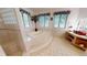 Bathroom with tiled tub, and separate vanity area at 1055 & 1075 Yorkshire St St, Port Charlotte, FL 33952