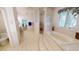 Bathroom with tiled tub and glass blocked shower at 1055 & 1075 Yorkshire St St, Port Charlotte, FL 33952