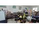 View of cluttered garage featuring storage solutions and work areas, but a lot of items at 1055 & 1075 Yorkshire St St, Port Charlotte, FL 33952