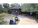 Outdoor living space with gazebo, chairs, and outdoor grill at 1055 & 1075 Yorkshire St St, Port Charlotte, FL 33952