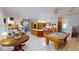 Open kitchen with a large center island, white countertops, wood cabinets, and modern appliances at 1055 & 1075 Yorkshire St St, Port Charlotte, FL 33952