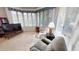 Bright sitting area features large windows and comfortable seating at 1055 & 1075 Yorkshire St St, Port Charlotte, FL 33952