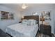 Comfortable bedroom with a large bed, soft bedding, and plenty of natural light at 129 Barre Nw Dr, Port Charlotte, FL 33952