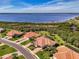 Gorgeous aerial view showcases beautiful waterfront homes and lush green landscapes in a serene neighborhood at 13049 Creekside Ln, Port Charlotte, FL 33953