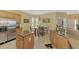 Modern kitchen with stainless steel appliances, granite countertops, and a breakfast nook for casual dining at 13049 Creekside Ln, Port Charlotte, FL 33953