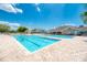 Resort-style pool with pristine blue water and brick patio, perfect for relaxation and community fun at 13049 Creekside Ln, Port Charlotte, FL 33953