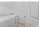 A laundry room with white washer and dryer at 14632 Sycamore Ct # 2621, Punta Gorda, FL 33955