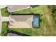 Aerial view of a beautiful home showcasing the pool and roofline at 14724 Cherry Blossom Way, Punta Gorda, FL 33955