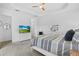 Bright bedroom featuring a trey ceiling, ceiling fan, and carpet flooring at 14724 Cherry Blossom Way, Punta Gorda, FL 33955