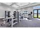 Well-equipped gym featuring a variety of modern weight machines for a full body workout at 14724 Cherry Blossom Way, Punta Gorda, FL 33955