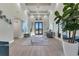 Bright lobby with large windows, modern decor, and comfortable seating creating an inviting space at 14724 Cherry Blossom Way, Punta Gorda, FL 33955