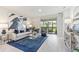 The Living room features stylish furniture, modern decor, and plenty of natural light at 16408 Bridle Ridge St, Port Charlotte, FL 33953