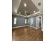 Modern bedroom features a ceiling fan, recessed lighting and tiled floors at 2031 Basin St, Port Charlotte, FL 33952