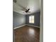 Bedroom with hard wood floors, crown molding, and a ceiling fan at 2031 Basin St, Port Charlotte, FL 33952
