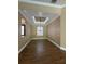 Bright dining room features decorative ceiling, modern lighting and neutral wall color at 2031 Basin St, Port Charlotte, FL 33952