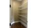 Walk-in pantry featuring custom shelving at 2031 Basin St, Port Charlotte, FL 33952