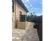 View of side yard with pavers, fence and AC unit at 2031 Basin St, Port Charlotte, FL 33952