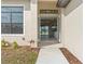 Open entryway showcasing a bright, airy interior with tiled floors and views into the living spaces at 23218 Fawn Ave, Punta Gorda, FL 33980