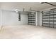 Spacious two-car garage featuring an automatic door opener and ample room for vehicle storage and projects at 23218 Fawn Ave, Punta Gorda, FL 33980