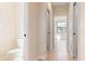 Hallway with views to bathroom and bedroom at 23218 Fawn Ave, Punta Gorda, FL 33980