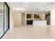 Open floorplan with tile flooring, recessed lighting, and lots of space for living and entertaining at 23218 Fawn Ave, Punta Gorda, FL 33980