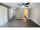 Bedroom featuring modern flooring, ceiling fan, closets, and access to a private bathroom at 2507 Linton Ln, Port Charlotte, FL 33952
