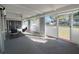 Enjoy the outdoors from this enclosed patio with comfortable seating and views of the lush backyard at 2507 Linton Ln, Port Charlotte, FL 33952