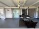 Enclosed back porch with ceiling fan and sliding doors at 2507 Linton Ln, Port Charlotte, FL 33952
