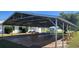 Covered community space with benches and tables at 30035 Alder Rd, Punta Gorda, FL 33982