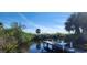 Community boat dock surrounded by nature at 30035 Alder Rd, Punta Gorda, FL 33982