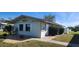 Exterior view of the community hall building at 30035 Alder Rd, Punta Gorda, FL 33982