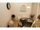 A nook featuring a circular table and four chairs, with an eye catching wall clock at 30035 Alder Rd, Punta Gorda, FL 33982